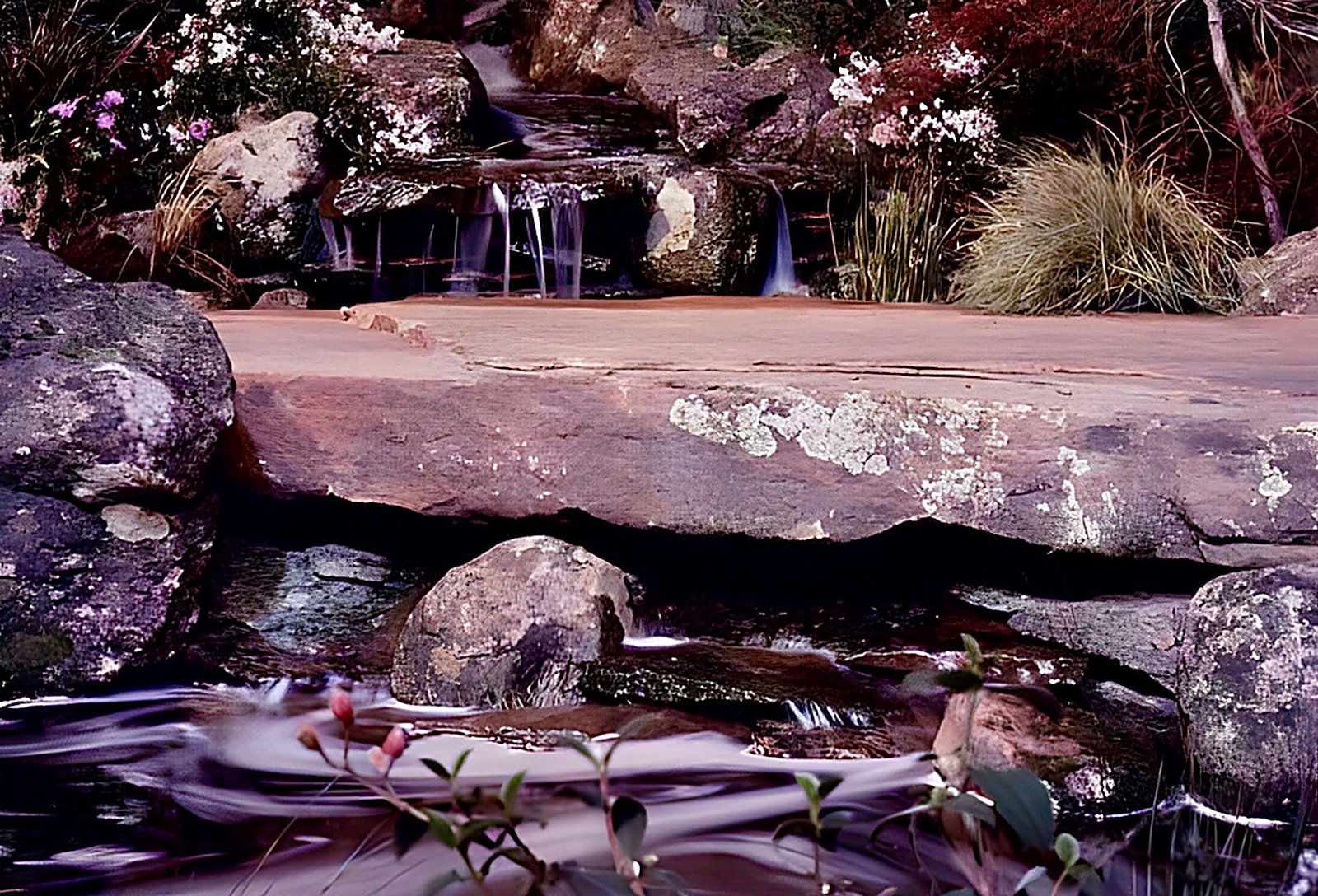 Fieldstone waterfall pool inspired by the Sierra Nevada